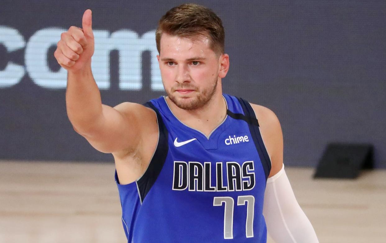 九游体育- 东契奇19分7失误 独行侠惨败76人 